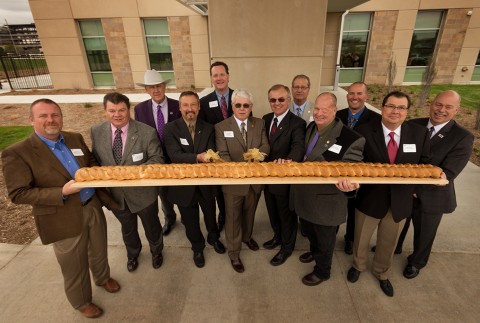 Bread Cutting Ceremony at the Opening of the Kansas Wheat Innovation Center. Photo Courtesy of the Kansas Wheat Commission