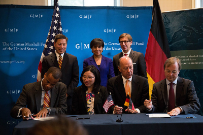 Assistant Secretary Williams (left) joins Secretary Pritzker (center) to sign an MOU with Germany