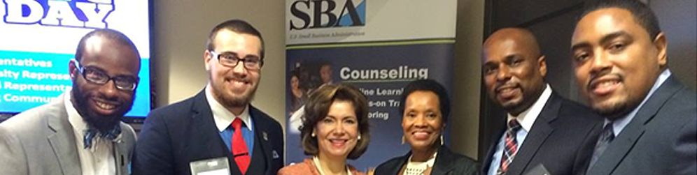Leadership Fellows with SBA Administrator from  left: Maurice Harris III; Zachary Corrothers; Maria Contreras Sweet, SBA  Administrator; Audrey Scott-Hinson, DSU Administrator; Dr. Michael H. Casson  Jr., UC Director; and Jamal Maddox