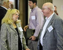 Economic RSF Coordinator Vicki Hendershot talks disaster recovery during a strategy meeting with Skip Smart, the Louisiana Economic Development official who is embedded with the Economic RSF Team in Louisiana