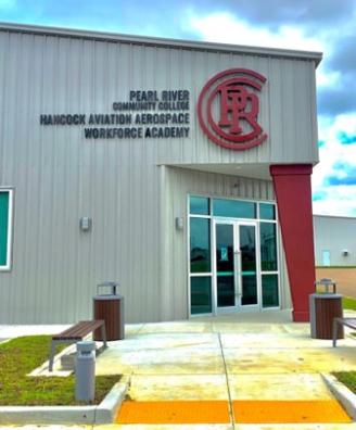 Photo of the Hancock Aviation Aerospace Workforce Academy building entrance