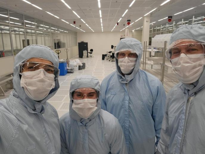 Photo of Deputy Assistant Secretary for Policy Cristina Killingsworth with representatives from the Corvallis Microfluidics Tech Hub.