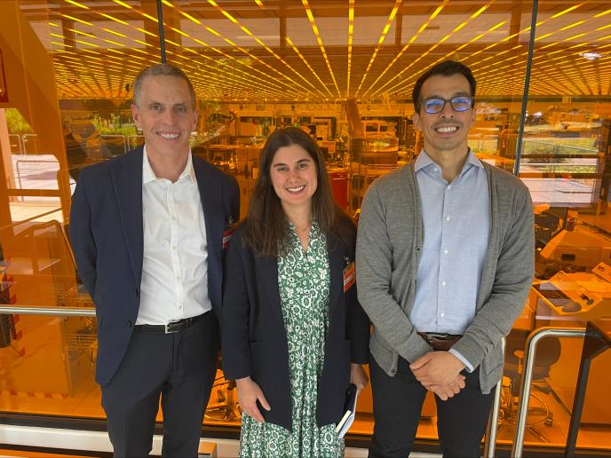 Photo of Deputy Assistant Secretary for Policy Cristina Killingsworth with representatives from the Corvallis Microfluidics Tech Hub.