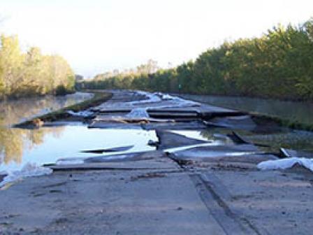 Images of the flooding and damage caused by floods on Highway 169 in Minnesota